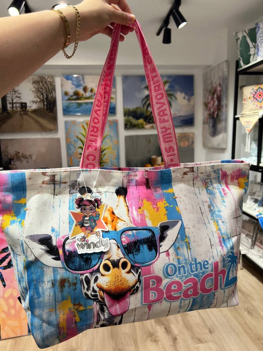 On the beach giraffe beach bag